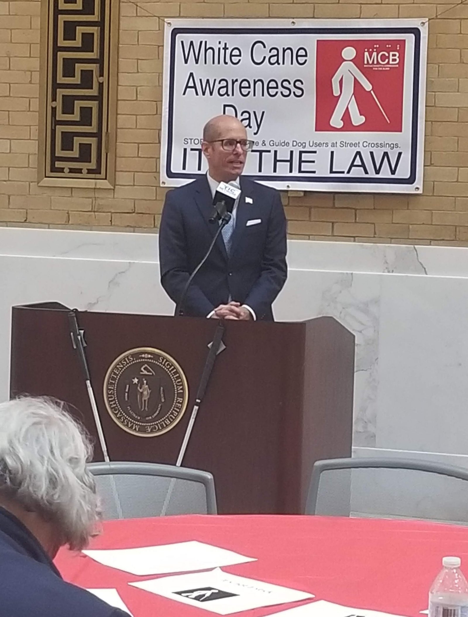 David D’Arcangelo speaking at a disability policy or government event.